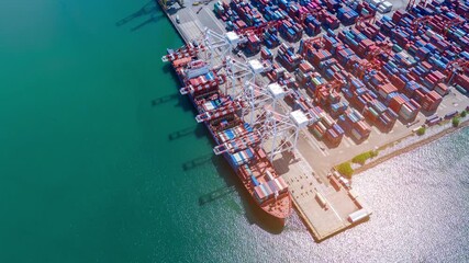 Wall Mural - time lapse Cargo Container Ship at  international customs sea port. Crane loading cargo working at industry port. working freight shipping import export shipping concept.