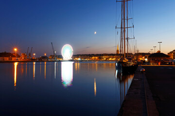 Night view of atlantic coast walled city historical old town of Saint Malo . Brittany .