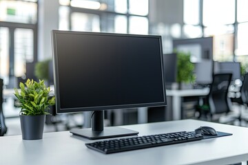 Wall Mural - Minimalist white desk with a computer and office background, blurred business center interior in the blurred background. Mockup for design or presentation
