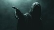 © Johannes - Grim reaper reaching towards the camera over dark background with copy space