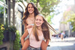 © Louis-Paul Photo - Best friends teen girl embracing each other with smiling