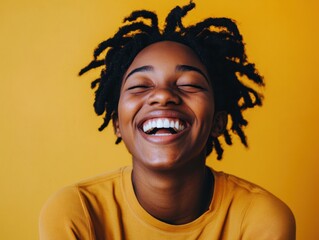 A laughing person, caught in a moment of pure joy, with their eyes squinting and a wide smile, creating a contagious sense of happiness.