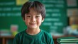 ©  Dreamy Shots - 'Smiling young boy sitting at his desk in a classroom, happy and eager to learn, surrounded by books, enjoying his school day in a positive learning environment.'