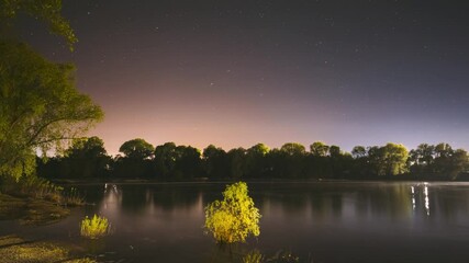 Wall Mural - Night Sky Above River. 4k Timelapse. Stars Float Across Sky. From Dusk To Dawn. Night Sky Turns Into Morning. Dawn Is Coming. Time Lapse. Time-lapse. Timelapse
