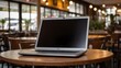 © Rady - Laptop computer monitor empty Screen in the Cafe. Buisness Work