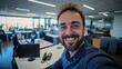 © wipawan - Selfie of a happy handsome man in an IT office, modern,coworkers, friends.
