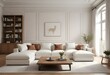 © Sharif54 - A modern, minimalist living room with a large white sectional sofa, a wooden coffee table, and built-in shelving units on the walls.