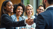 © humanaut - Successful Business Agreement Sealed with a Handshake in a Professional Meeting