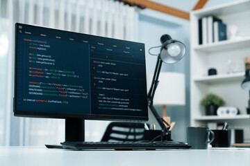 programming code on computer screen desktop placing on working desk showing intelligent website deve