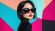 © suryono - Stylish Woman with Sunglasses Against Colorful Geometric Wall