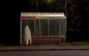 Halloween night with ghost at bus station