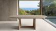 © Chari - Modern oval dining table in minimalist indoor setting with scenic coastal view