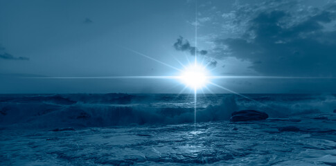 Poster - Strong sea waves crushing on rocky coast on stormy weather with cloudy dramatic sunset sky over the sea