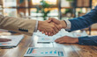 © ashan - business people shaking hands on a deal