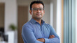 © Ольга Ничипорчук - Headshot of skilled hindu male employee standing with arms crossed in modern office, successful confident mixed-race man wearing eyeglasses and smart casual, business portrait of i