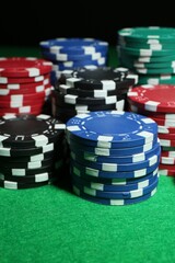 Sticker - Poker game. Casino chips on green table, closeup