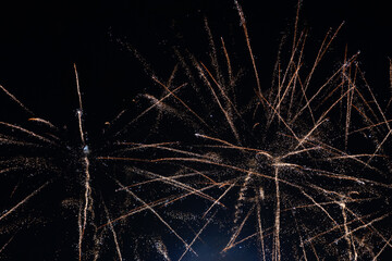 Fireworks on the dark sky background at festival.