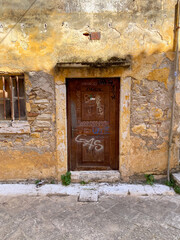 old wooden door in town corfu