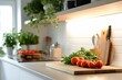 © Sebelas Studio - Fresh vegetables on a kitchen countertop with herbs and utensils.
