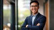 © IQ-Photography - Happy young beautiful business man professional executive manager standing in office arms crossed