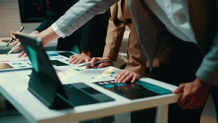 Fototapete - Businesspeople in a meeting room are pointing at documents and using interactive touchscreen to analyze financial data displayed on it