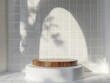 © Sinechana - 2408 85.A minimalist 3D display featuring a white podium with a wooden top, set against a backdrop of square tiles. The clean lines and natural textures create a harmonious environment for showcasing