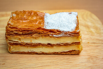 Mille feuille cake layers cream napoleon dessert.