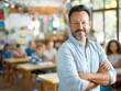 © Mutimul - A man is posing for a picture in front of a classroom, generative ai image