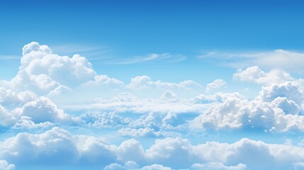 Wall Mural - a panoramic view of a blue sky with soft, white clouds