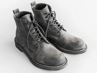 Wall Mural - A pair of boots on grey background