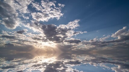 Wall Mural - movement of beautiful clouds across the sky with reflection in the lake, abstract, 4k, video, loop