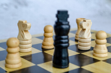 The final move approaches in this epic chess endgame. Business strategy concept