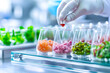 © zamuruev - A technician wearing a glove carefully adds a drop of red liquid to several glass containers filled with vibrant food samples, showcasing the intricate work in a food research laboratory
