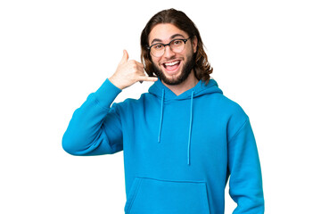 Young handsome man over isolated chroma key background making phone gesture. Call me back sign