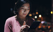 © LuxeShutter24/peopleimages.com - Night, business and Asian woman with smartphone, city and typing with internet, social media and chatting. Person, evening and employee with cellphone, mobile user and message to contact and texting