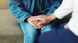 © LuxeShutter24/peopleimages.com - Comfort, kid and holding hands with psychologist for help, care and kindness in clinic. Support, therapy and people together closeup for mental health, childhood trauma and depression from bullying