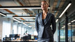 © Svetlana - Confident businesswoman in formal suit standing in modern office environment
