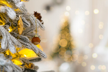 Wall Mural - christmas balls on a tree with bokeh in the background, merry christmas, shallow depth of field, nev