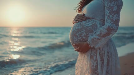 Sticker - Relaxation, peace of mind, sea air. Close-up of the tummy. A pregnant woman on the beach by the sea. The concept of pregnancy, childbirth and parental responsibilities.  