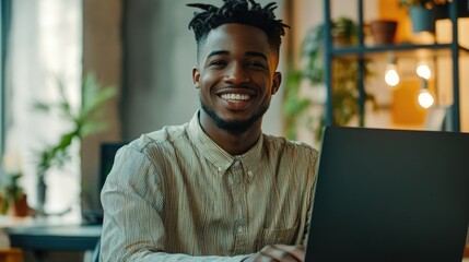 Poster - A person smiling while working on a laptop, possibly at home or in an office