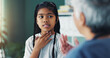 © LuxeShutter24/peopleimages.com - Child, girl and doctor in office for consultation, speech therapy or health treatment for sore throat. Healthcare, pediatrician and sick kid in clinic for advice, professional help or medical checkup