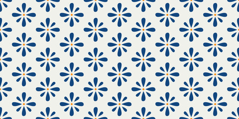 Seamless pattern with simple floral motif in blue