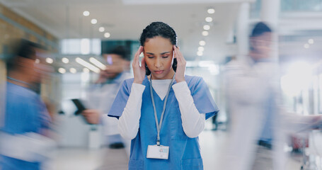 nurse, woman and headache in hospital with stress of medical mistake, overworked and burnout. motion