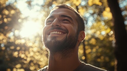 Man smiling at sun