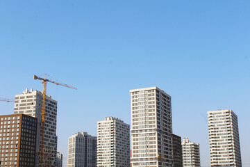 building under construction, construction site with crane