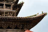 Asian Chinese historical tourist attractions, Feiyun Tower on a rainy day, a pure wooden tower pavilion ancient building. The word "飞云楼" on the tower door plaque means: Feiyun Tower.