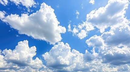 a peaceful sky scene where white clouds form a soft frame around an empty blue space, perfect for te