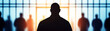 © Nakarin - silhouette of suspect standing in police identification lineup, surrounded by other shadowy figures. scene conveys sense of tension and mystery