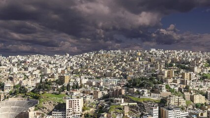 Wall Mural - View of the modern houses Amman, Jordan, Middle East. Against the background of a beautiful sky with clouds. 4K, time lapse