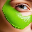 © Noppakun - Closeup of Face with Green Mask Treatment
